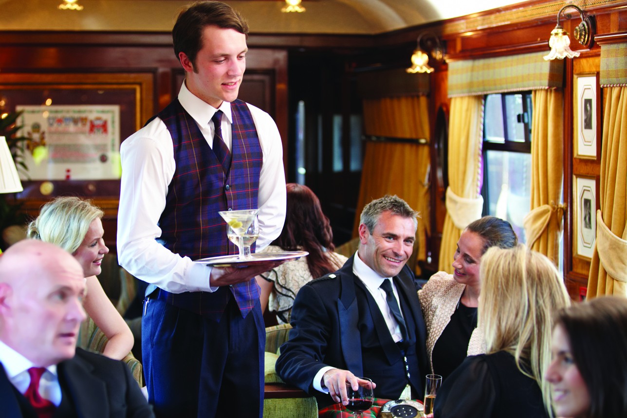 Belmond-royal-scotsman-busy-bar-car-steward-serving-trs-bar-06-matt ...